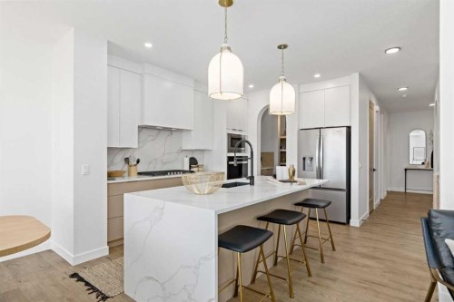 1010 Fowler Road Sw, Airdrie, AB - Indoor Photo Showing Kitchen With Upgraded Kitchen