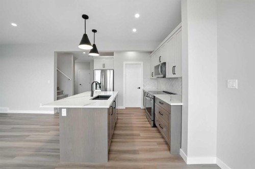 45 Thorkman Avenue, Red Deer, AB - Indoor Photo Showing Kitchen With Upgraded Kitchen