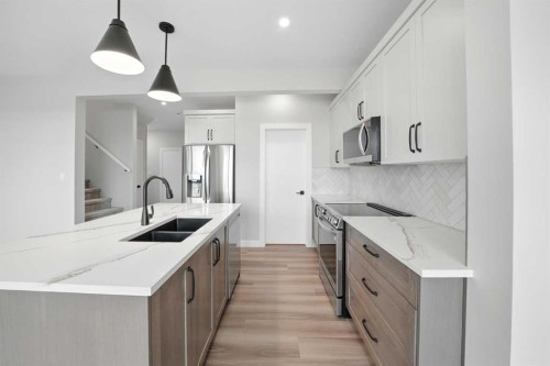 45 Thorkman Avenue, Red Deer, AB - Indoor Photo Showing Kitchen With Double Sink With Upgraded Kitchen