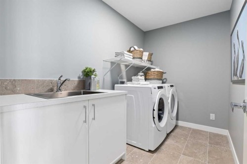 207 Huxland Path, Calgary, AB - Indoor Photo Showing Laundry Room