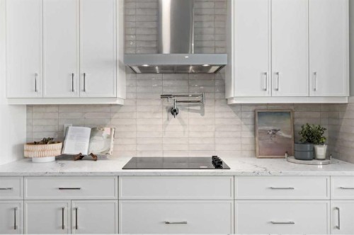 207 Huxland Path, Calgary, AB - Indoor Photo Showing Kitchen With Upgraded Kitchen