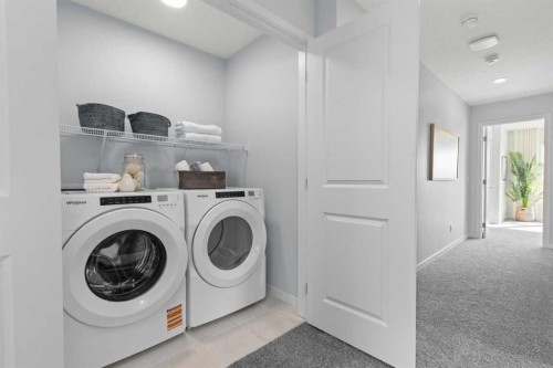 139 Huxland Road Ne, Calgary, AB - Indoor Photo Showing Laundry Room