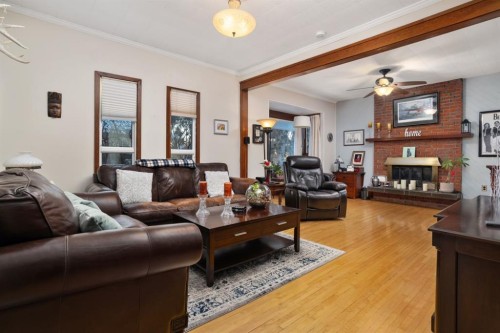 4825 51 St, Sedgewick, AB - Indoor Photo Showing Living Room With Fireplace