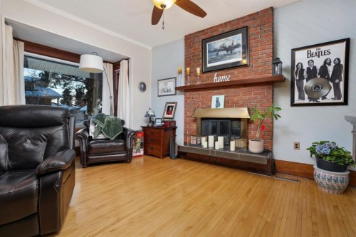 4825 51 St, Sedgewick, AB - Indoor Photo Showing Living Room With Fireplace