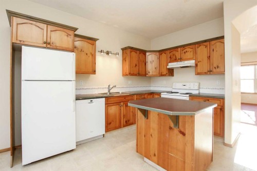 25 Adams Close, Red Deer, AB - Indoor Photo Showing Kitchen With Double Sink