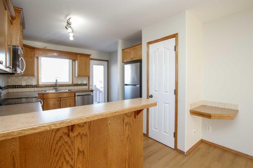 72 Ironstone Drive, Red Deer, AB - Indoor Photo Showing Kitchen With Double Sink