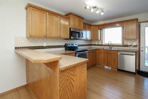 72 Ironstone Drive, Red Deer, AB - Indoor Photo Showing Kitchen With Double Sink