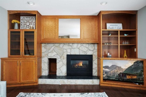 22 Denovan Crescent, Red Deer, AB - Indoor Photo Showing Living Room With Fireplace