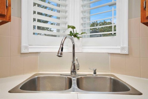 22 Denovan Crescent, Red Deer, AB - Indoor Photo Showing Kitchen With Double Sink