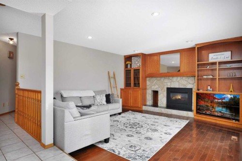 22 Denovan Crescent, Red Deer, AB - Indoor Photo Showing Living Room With Fireplace