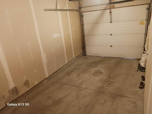 72 Arthur Close, Red Deer, AB - Indoor Photo Showing Garage