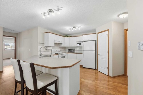 24D-32 Daines Avenue, Red Deer, AB - Indoor Photo Showing Kitchen With Double Sink