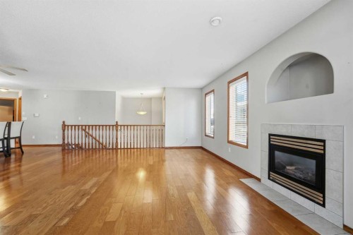 24D-32 Daines Avenue, Red Deer, AB - Indoor Photo Showing Living Room With Fireplace