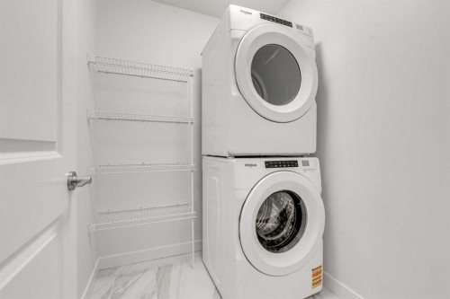 1123 Fowler Road Sw, Airdrie, AB - Indoor Photo Showing Laundry Room