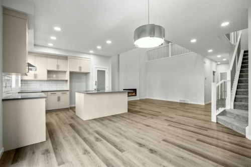 158 Osprey Hill Way Sw, Calgary, AB - Indoor Photo Showing Kitchen With Upgraded Kitchen