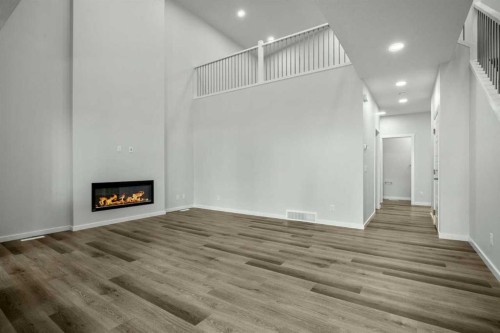158 Osprey Hill Way Sw, Calgary, AB - Indoor With Fireplace