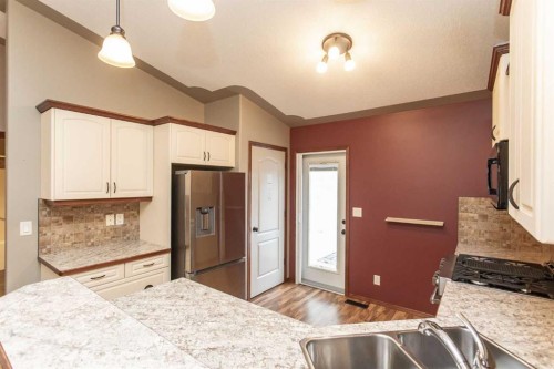 12 Irving Crescent, Red Deer, AB - Indoor Photo Showing Kitchen With Double Sink