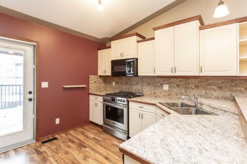 12 Irving Crescent, Red Deer, AB - Indoor Photo Showing Kitchen With Double Sink