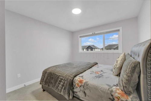 119 Crestview Boulevard, Sylvan Lake, AB - Indoor Photo Showing Bedroom