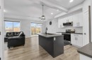 119 Crestview Boulevard, Sylvan Lake, AB  - Indoor Photo Showing Kitchen With Stainless Steel Kitchen With Upgraded Kitchen 