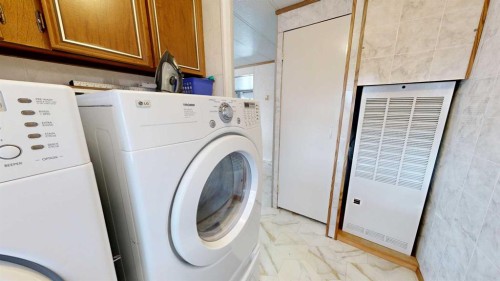 6007 Spruce Drive, Stettler, AB - Indoor Photo Showing Laundry Room