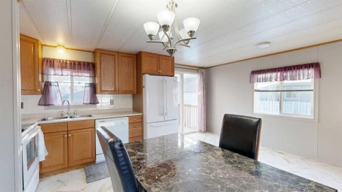 6007 Spruce Drive, Stettler, AB - Indoor Photo Showing Kitchen With Double Sink