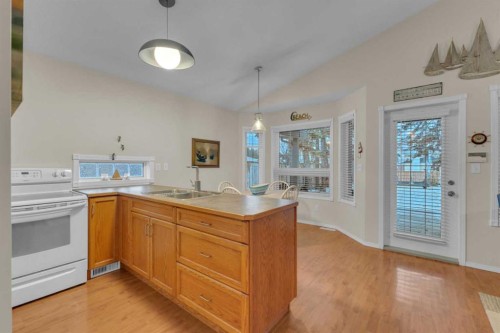 5003 36 Street, Sylvan Lake, AB - Indoor Photo Showing Kitchen With Double Sink