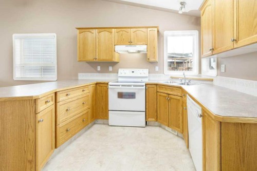 207 Lancaster Drive, Red Deer, AB - Indoor Photo Showing Kitchen With Double Sink