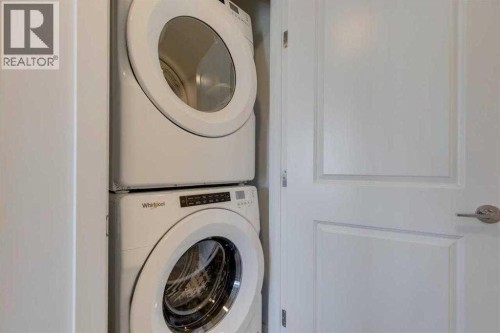 438-65 Belvedere Pointe Se, Calgary, AB - Indoor Photo Showing Laundry Room
