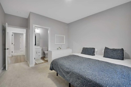 12 Hammond Close, Sylvan Lake, AB - Indoor Photo Showing Bedroom