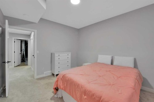 12 Hammond Close, Sylvan Lake, AB - Indoor Photo Showing Bedroom