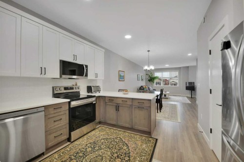 12 Hammond Close, Sylvan Lake, AB - Indoor Photo Showing Kitchen With Upgraded Kitchen