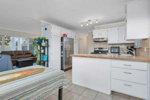 5702 West Park Crescent, Red Deer, AB - Indoor Photo Showing Kitchen With Double Sink