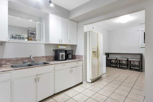 5702 West Park Crescent, Red Deer, AB - Indoor Photo Showing Kitchen With Double Sink