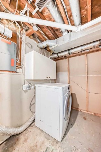 168 Tamarac Boulevard, Springbrook, AB - Indoor Photo Showing Laundry Room