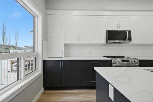 70 Palmer Circle, Blackfalds, AB - Indoor Photo Showing Kitchen