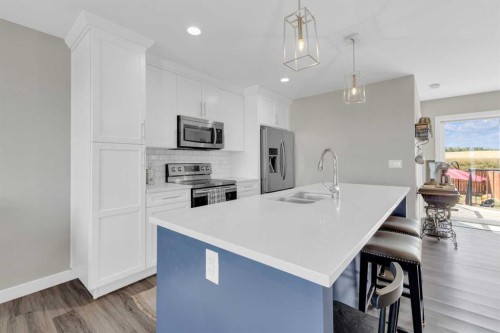 4146 Ryders Ridge Boulevard, Sylvan Lake, AB - Indoor Photo Showing Kitchen With Double Sink With Upgraded Kitchen