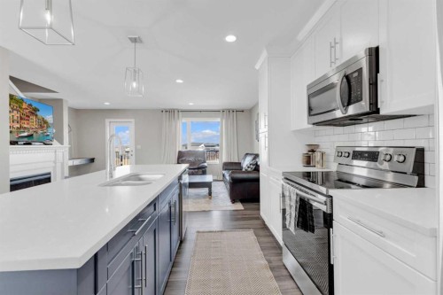 4146 Ryders Ridge Boulevard, Sylvan Lake, AB - Indoor Photo Showing Kitchen With Stainless Steel Kitchen With Upgraded Kitchen