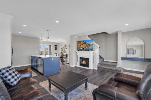 4146 Ryders Ridge Boulevard, Sylvan Lake, AB - Indoor Photo Showing Living Room With Fireplace