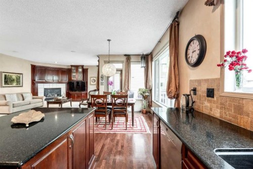 40 Cougar Ridge Heights Sw, Calgary, AB - Indoor With Fireplace
