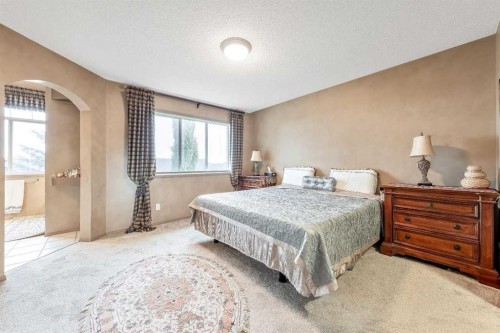40 Cougar Ridge Heights Sw, Calgary, AB - Indoor Photo Showing Bedroom