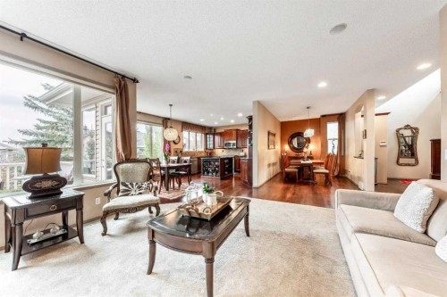 40 Cougar Ridge Heights Sw, Calgary, AB - Indoor Photo Showing Living Room