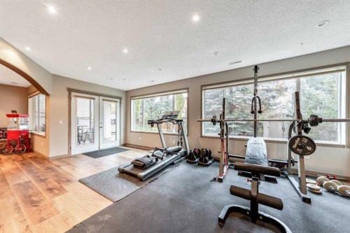 40 Cougar Ridge Heights Sw, Calgary, AB - Indoor Photo Showing Gym Room