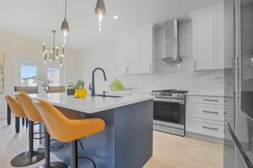 30 Palmer Circle, Blackfalds, AB - Indoor Photo Showing Kitchen With Upgraded Kitchen