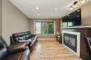 3717 45 Street, Red Deer, AB  - Indoor Photo Showing Living Room With Fireplace 