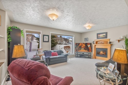 5 Atlee Close, Red Deer, AB - Indoor Photo Showing Living Room With Fireplace