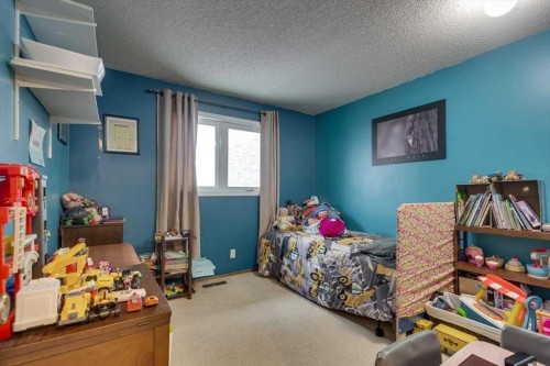 57 Mcdougall Crescent, Red Deer, AB - Indoor Photo Showing Bedroom