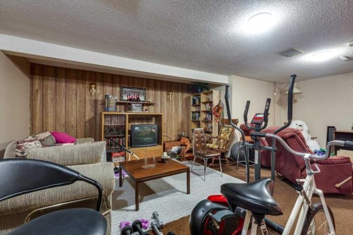 57 Mcdougall Crescent, Red Deer, AB - Indoor With Fireplace