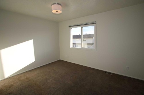 44-7124 Gray Drive, Red Deer, AB - Indoor Photo Showing Other Room