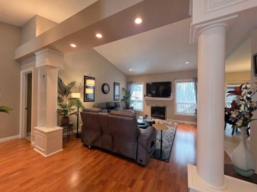 185 Willow Drive, Breton, AB - Indoor Photo Showing Living Room With Fireplace